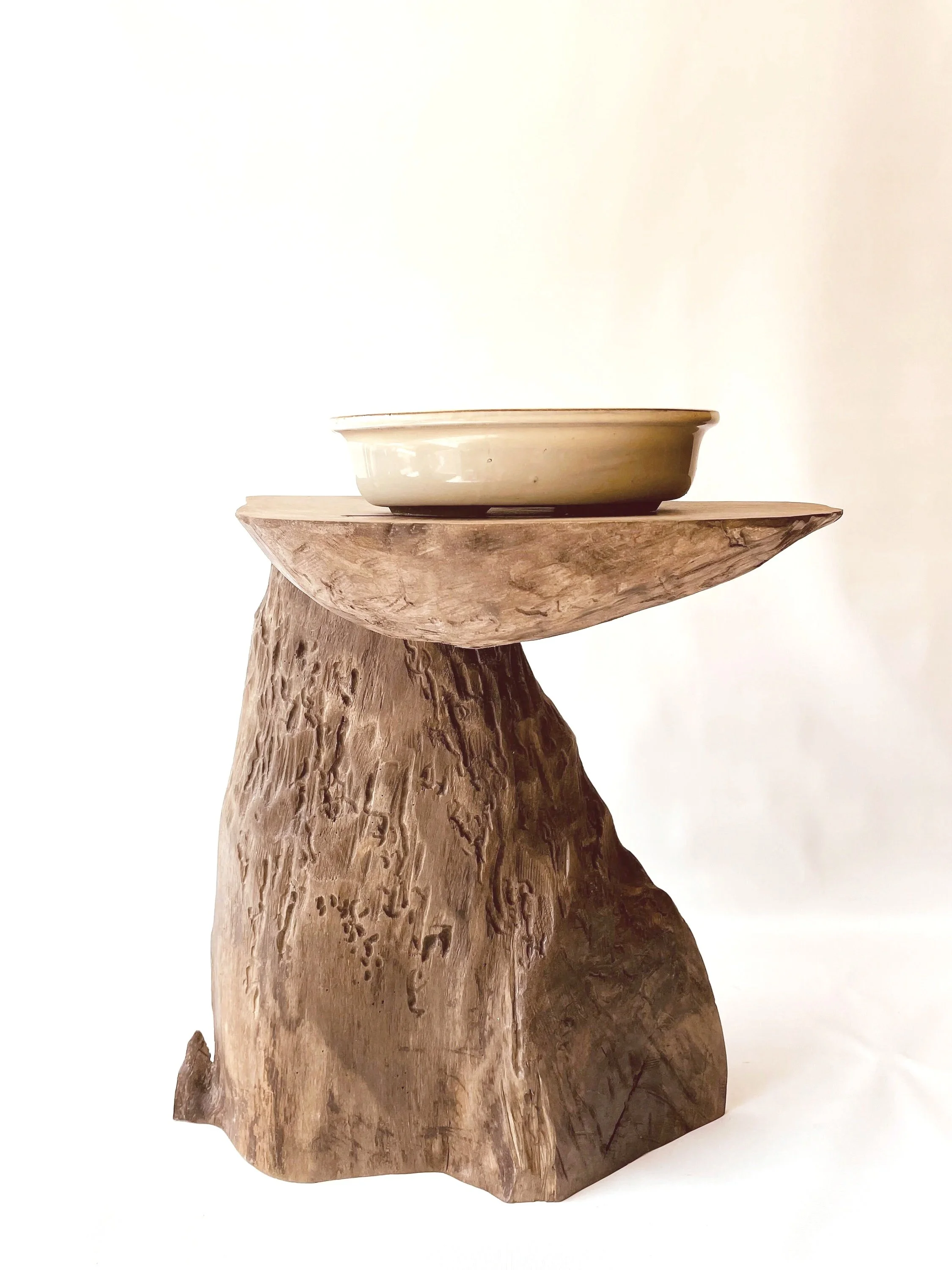 A rustic cascade style bonsai stand resembling a mountain
