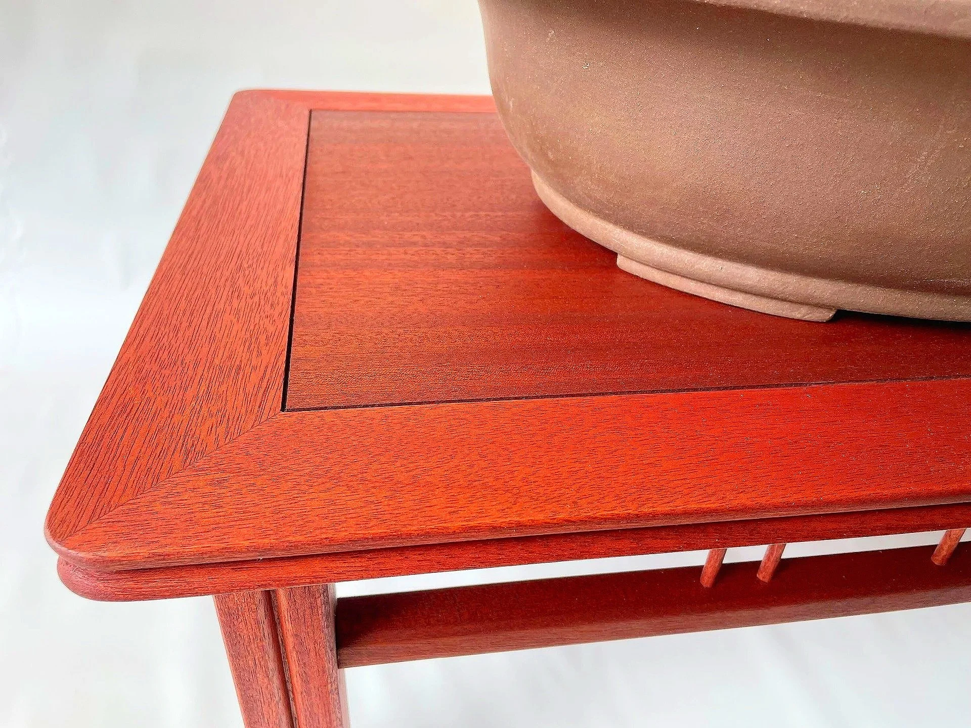 Close-up view of a bonsai table showcasing precision joinery