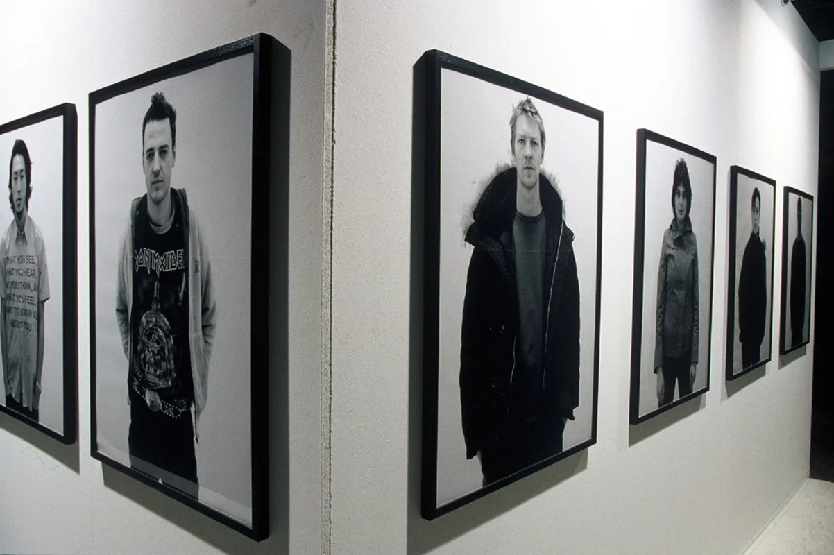 United colours, installation view, Military ribbons, framed black-and-white photographs, artist book, 2002