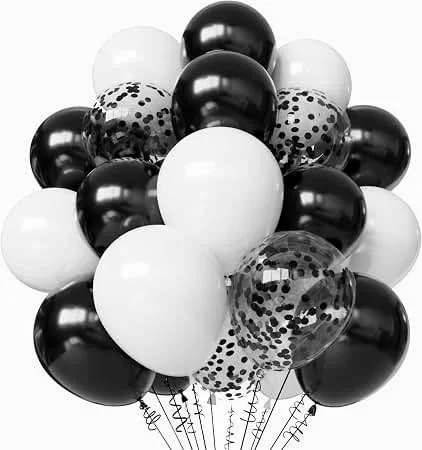 A bunch of black, white, and clear balloons with black confetti inside, arranged together.