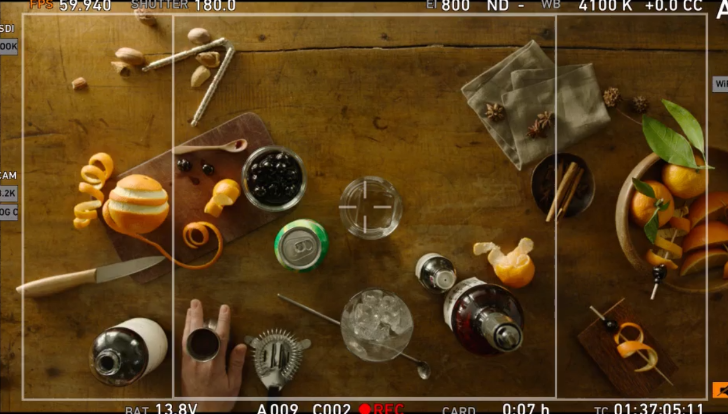 Behind-the-scenes detail from a 7Up production featuring a handcrafted cocktail, styled with citrus and garnish alongside product.