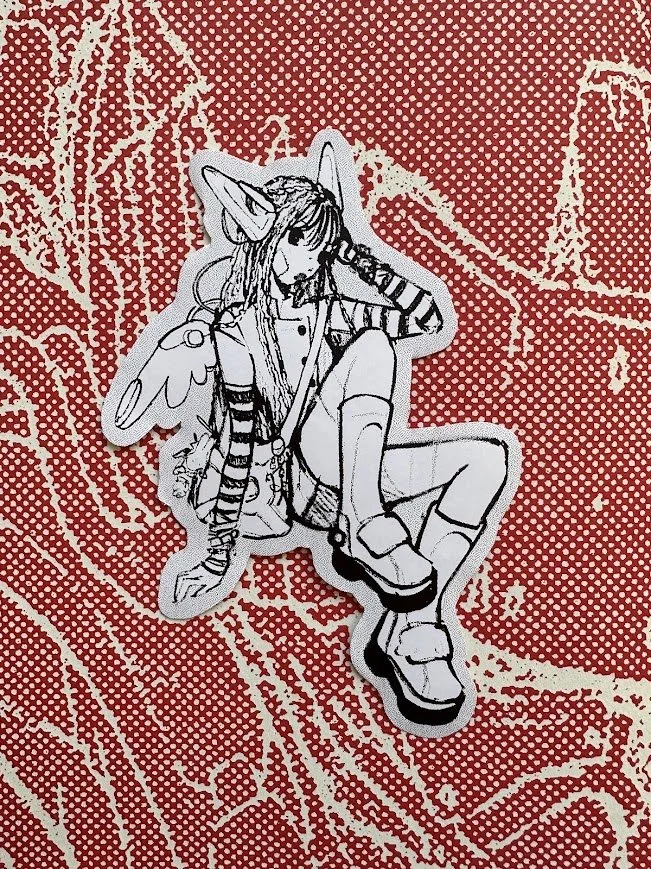 Black and white illustration of a girl with fox ears and long hair, wearing striped arm warmers, a jacket, shorts, and high boots, sitting on a stylized background with tree branches.