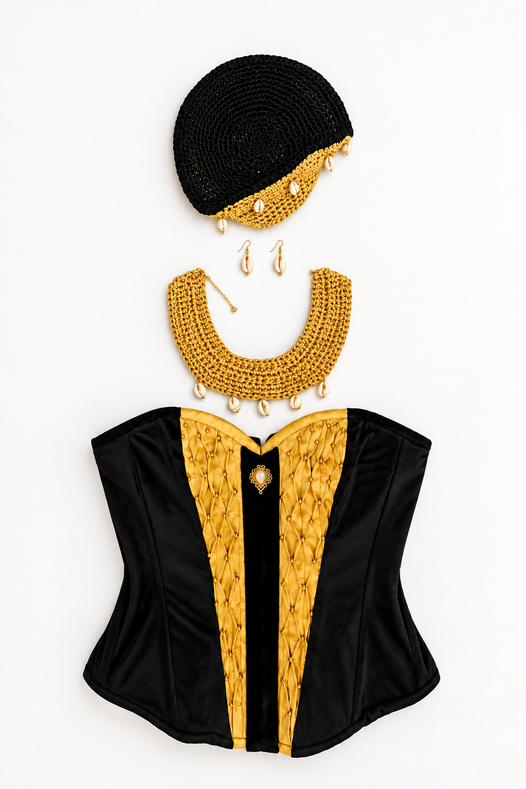 Handmade black-and-gold hat, earrings, necklace and corset arranged on a white background to suggest the form of an absent body.