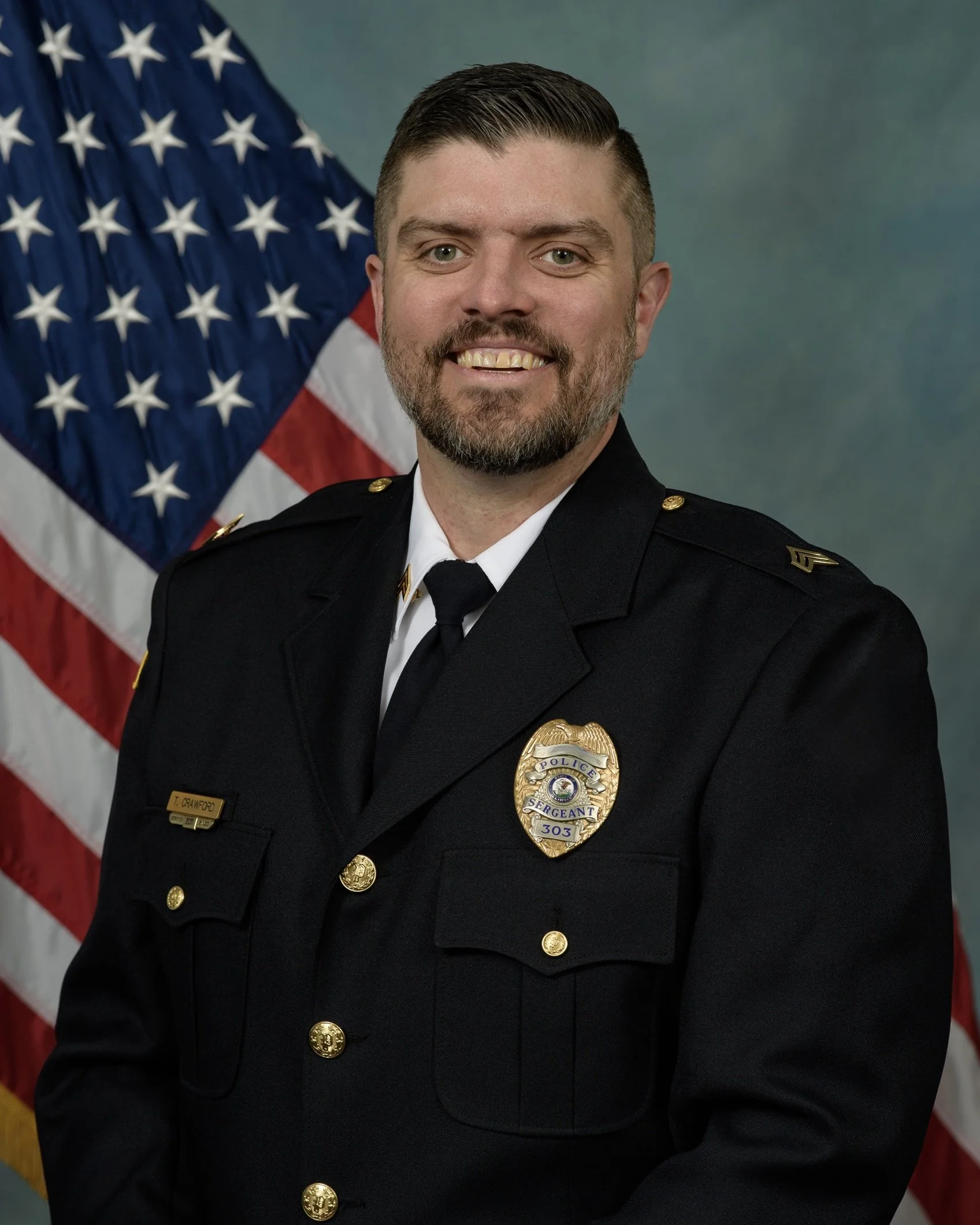 Theodore J. Crawford, founder of Crawford Law, LLC, in law enforcement uniform.