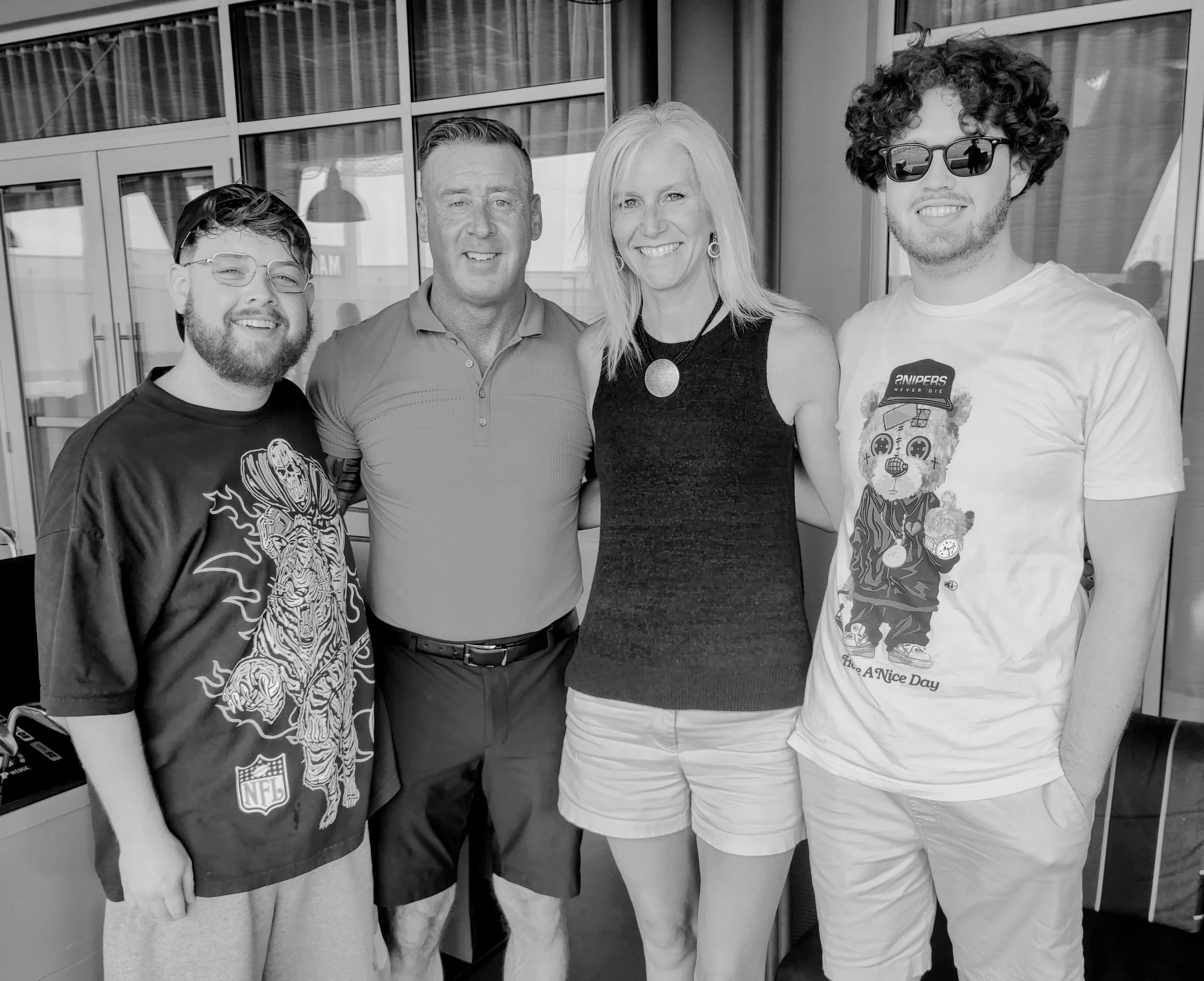 Ty Fischer with his wife Holly and sons Adam and Derek.