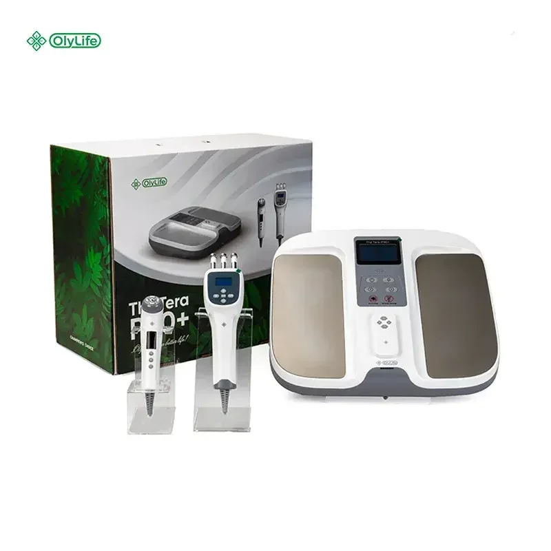 A set of medical or beauty treatment devices, including a large machine with a display screen and multiple buttons, a handheld device with a digital display, and two smaller handheld tools, along with a box in the background.