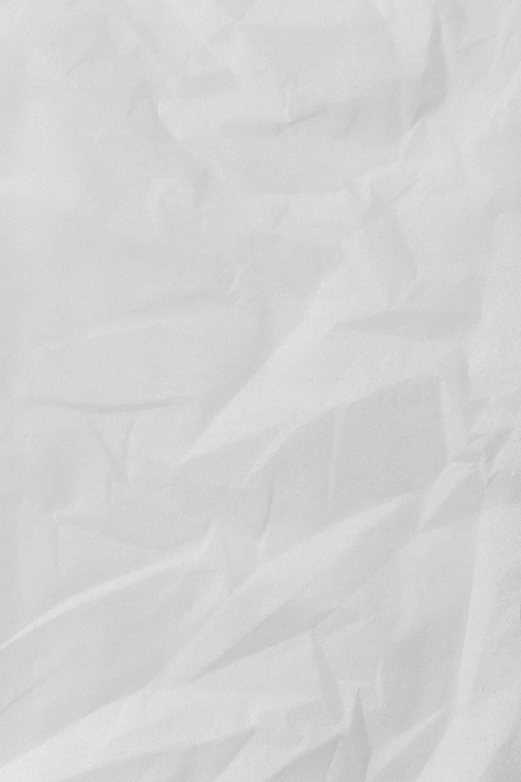 A crumpled sheet of white paper.