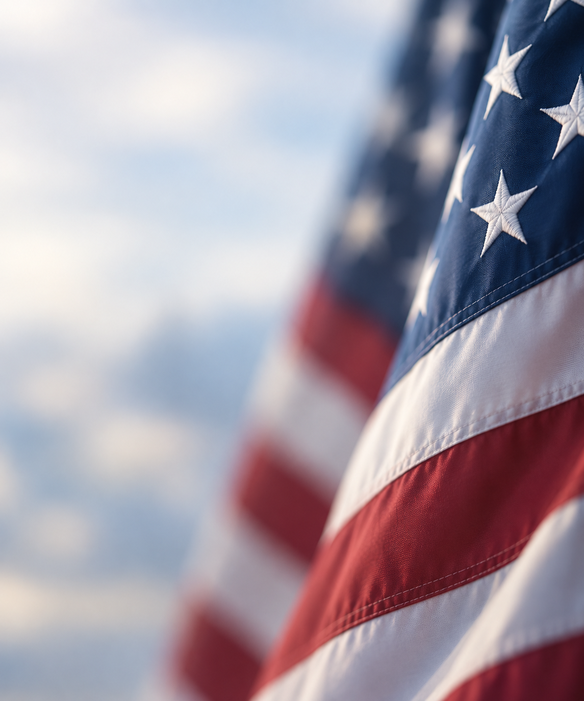 Close-up of the American flag waving in the breeze.