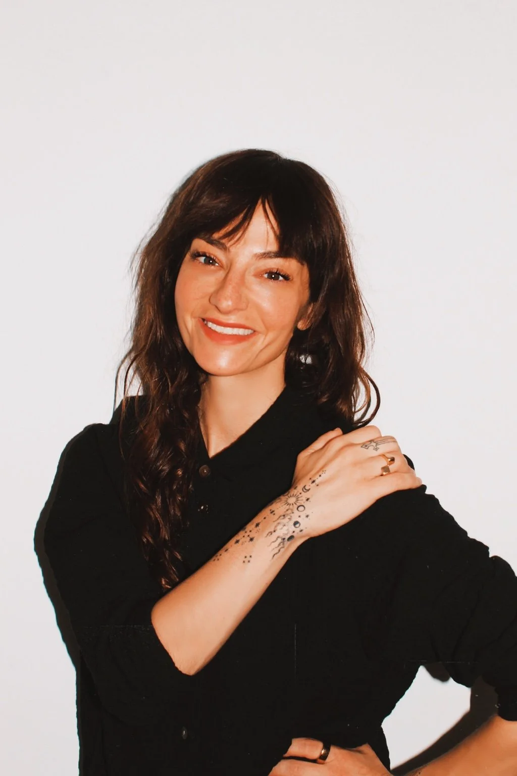 Rachel Rose Katz smiling in a black shirt