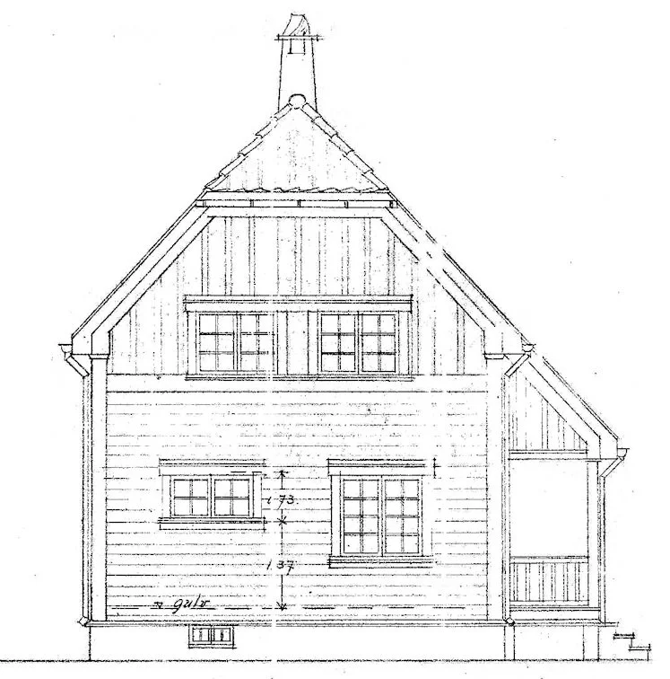 Architectural drawing of a house side elevation, showing windows, a door, and roof details with measurements marked.