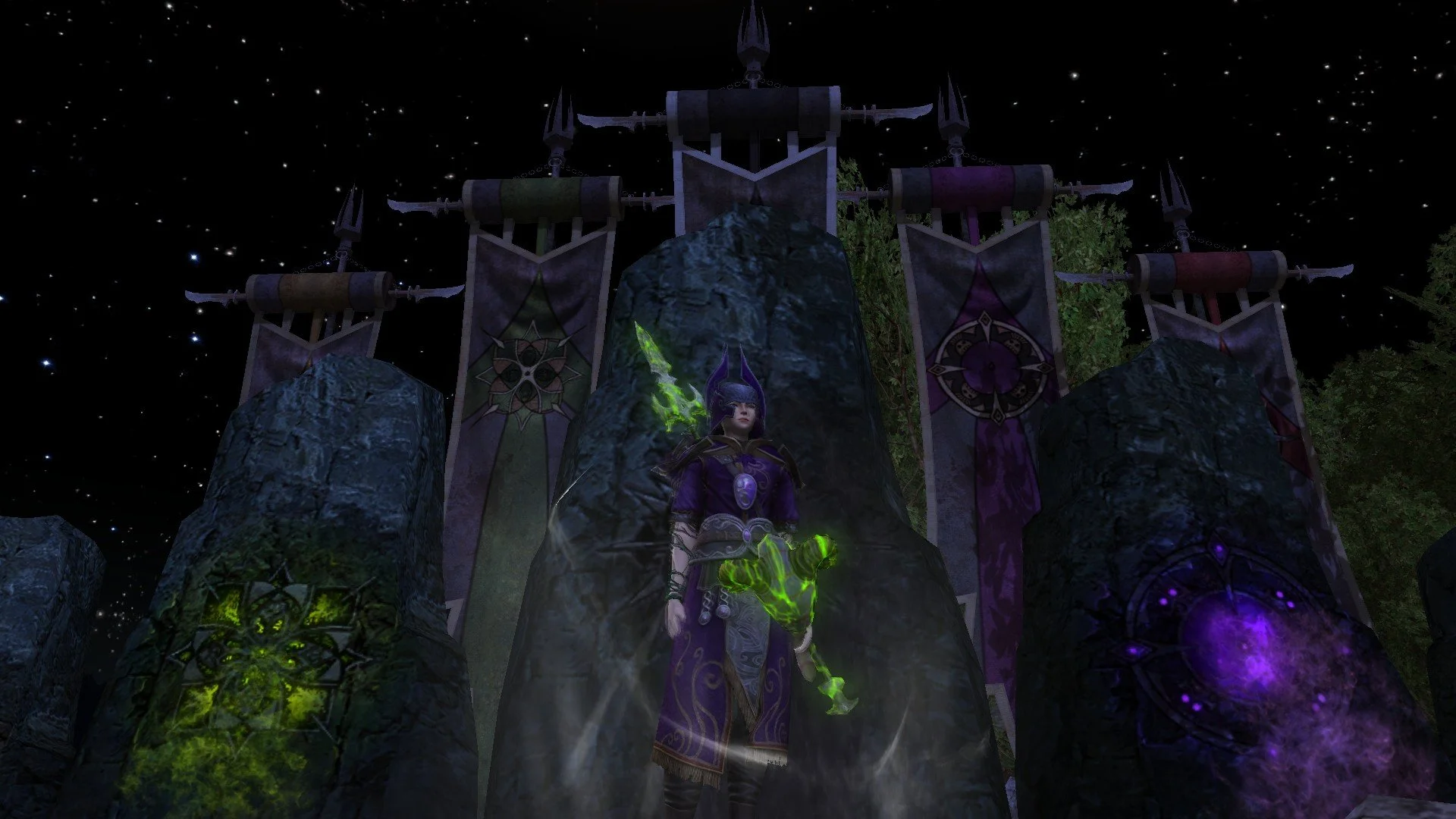 A fantasy scene at night with a dark starry sky. In the foreground, a female character dressed in purple robes with glowing green eyes and holding a glowing green weapon stands amidst large stone pillars. Behind her, tall banners with mystical symbols hang from structures, and trees are partially visible on the sides.