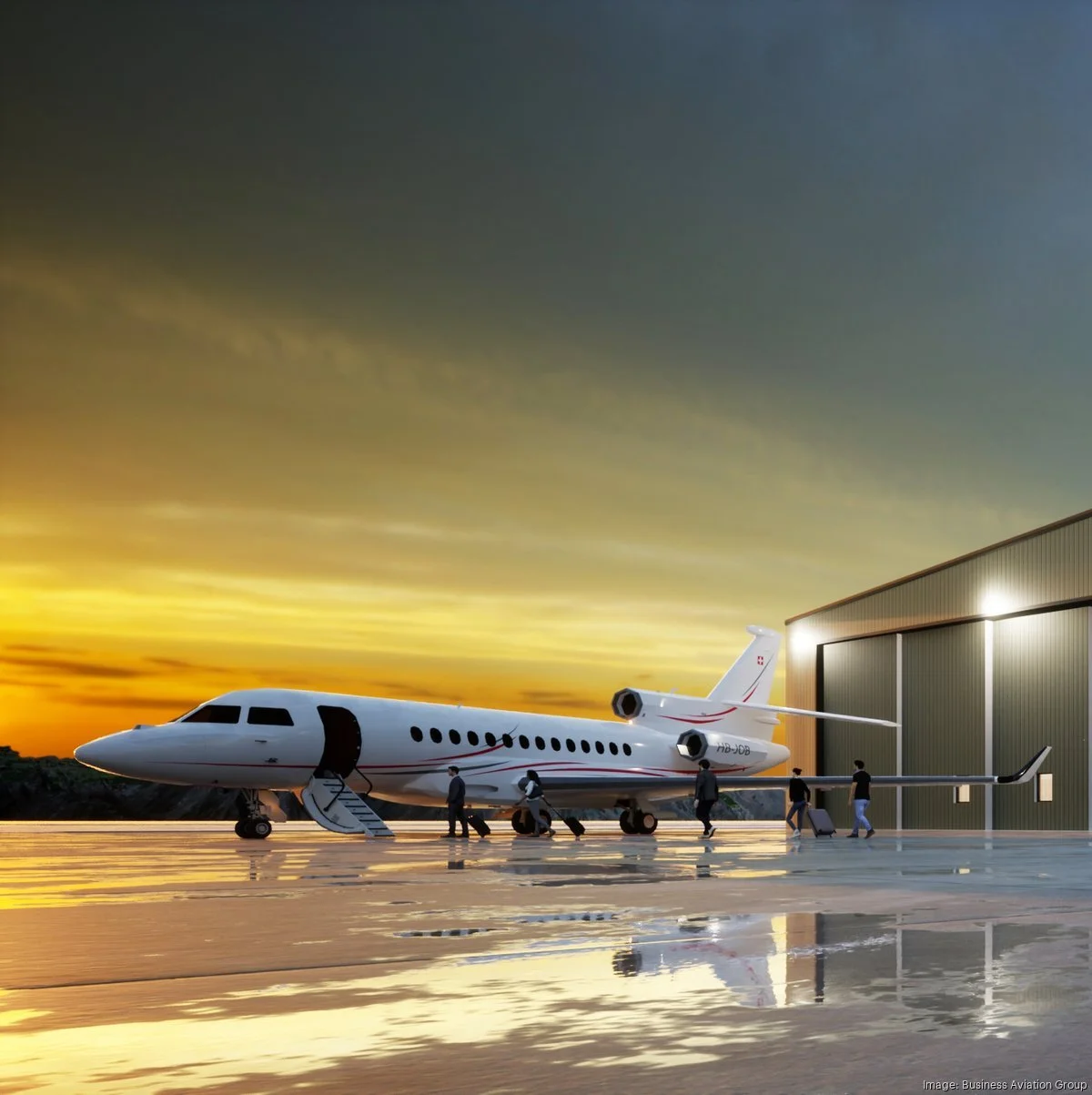 Business jet airplane with passengers boarding at sunset on an airport tarmac next to a hangar.