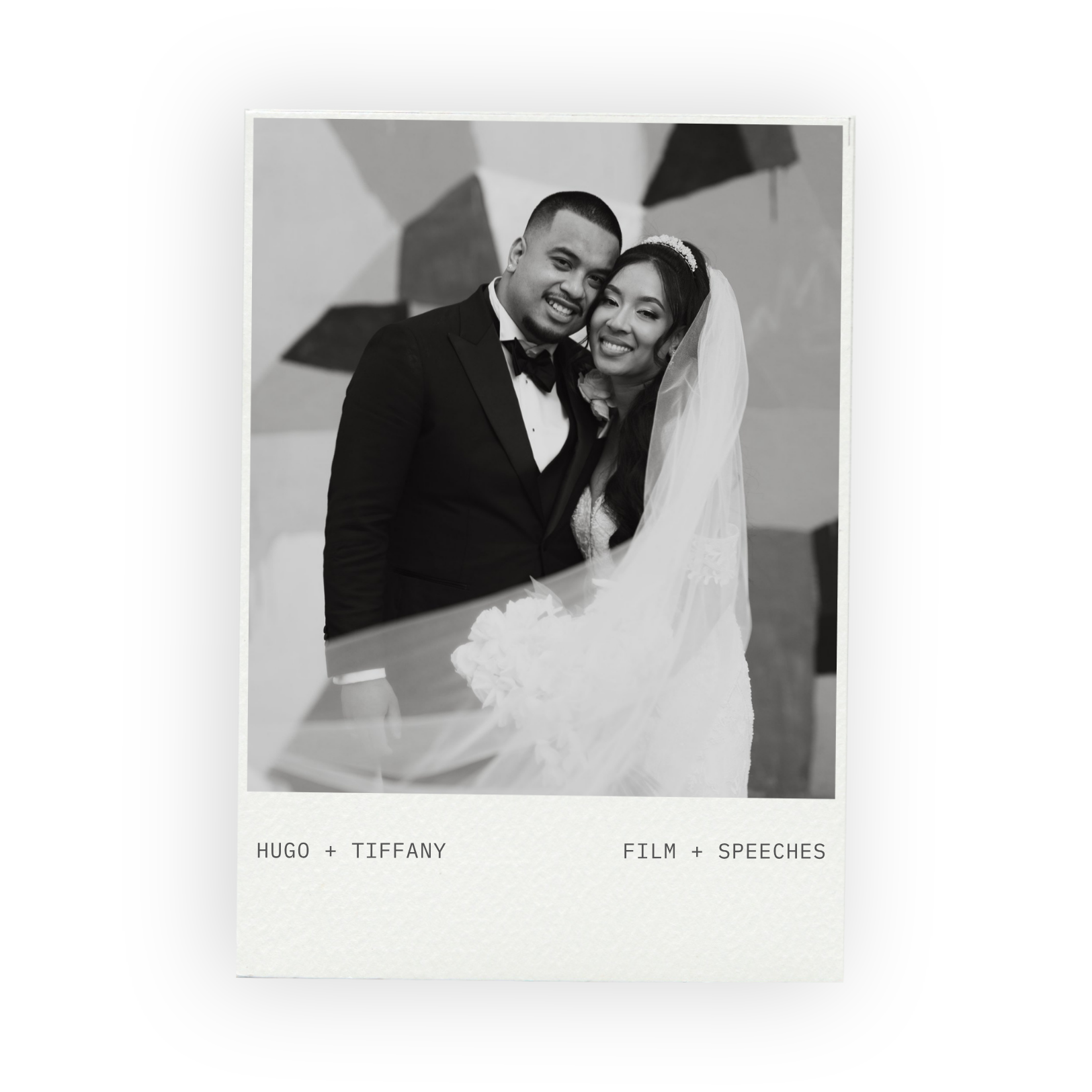Black and white portrait of a smiling bride and groom cheek to cheek
