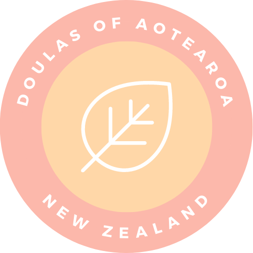 Logo for Doulas of Aotearoa, New Zealand, featuring a white leaf outline in the center on a peach circle with a pink outer ring.