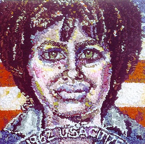 Displaced Citizen, 2003, discarded clothing, 11 x 11 in, inspired by the artist's certificate of citizenship