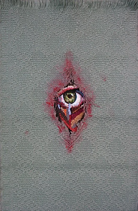TEAR, 2012, discarded clothing, placemat, acrylic, 20 14 in