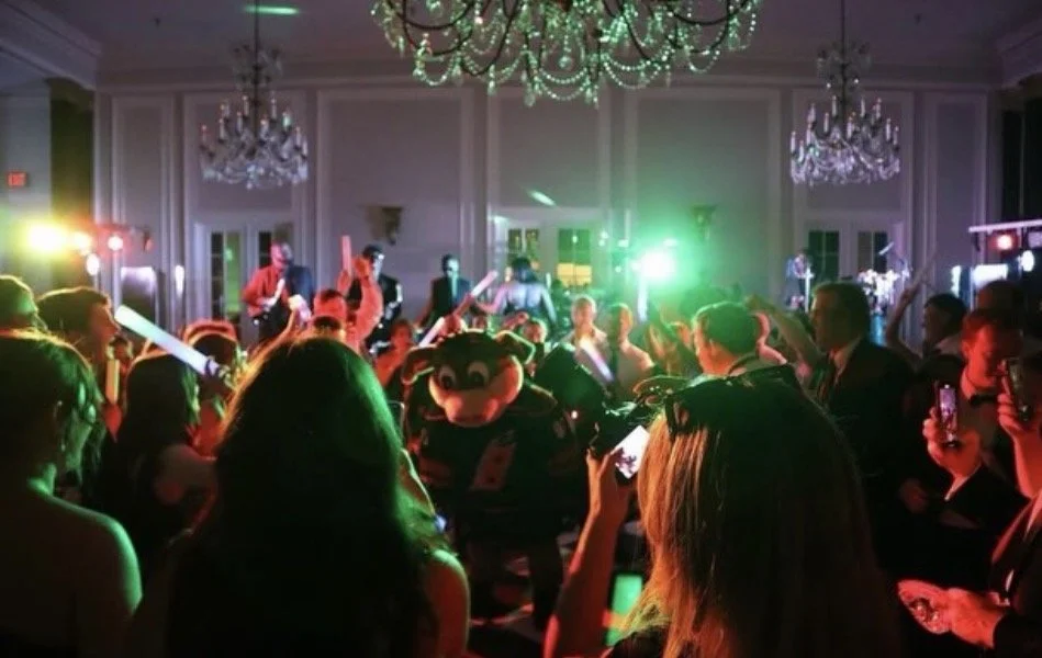 Wedding reception. Stormy, NC Hurricanes Hockey team. Photography, content creation. 