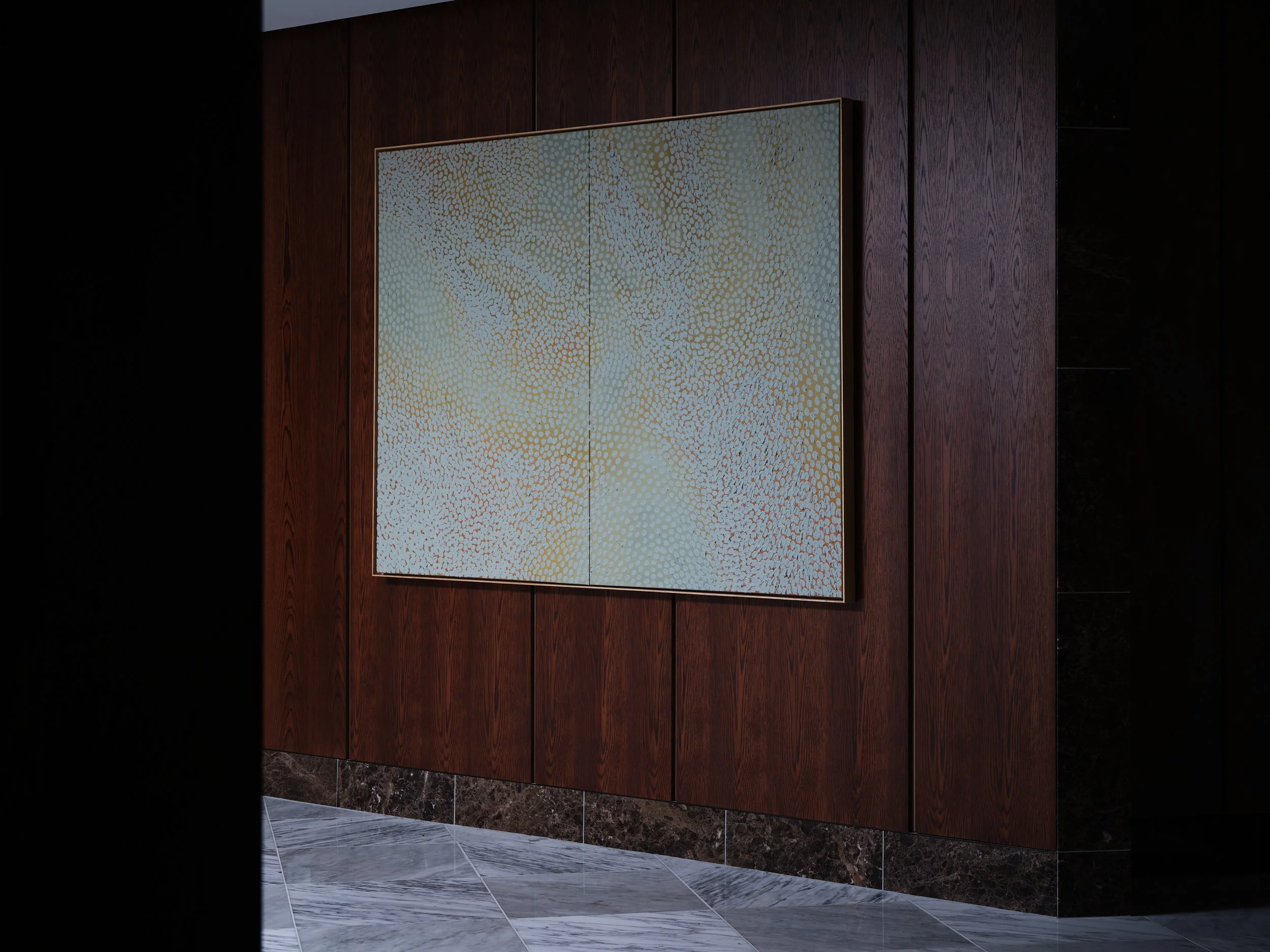 Raukura Turea painting on dark wood panelled wall