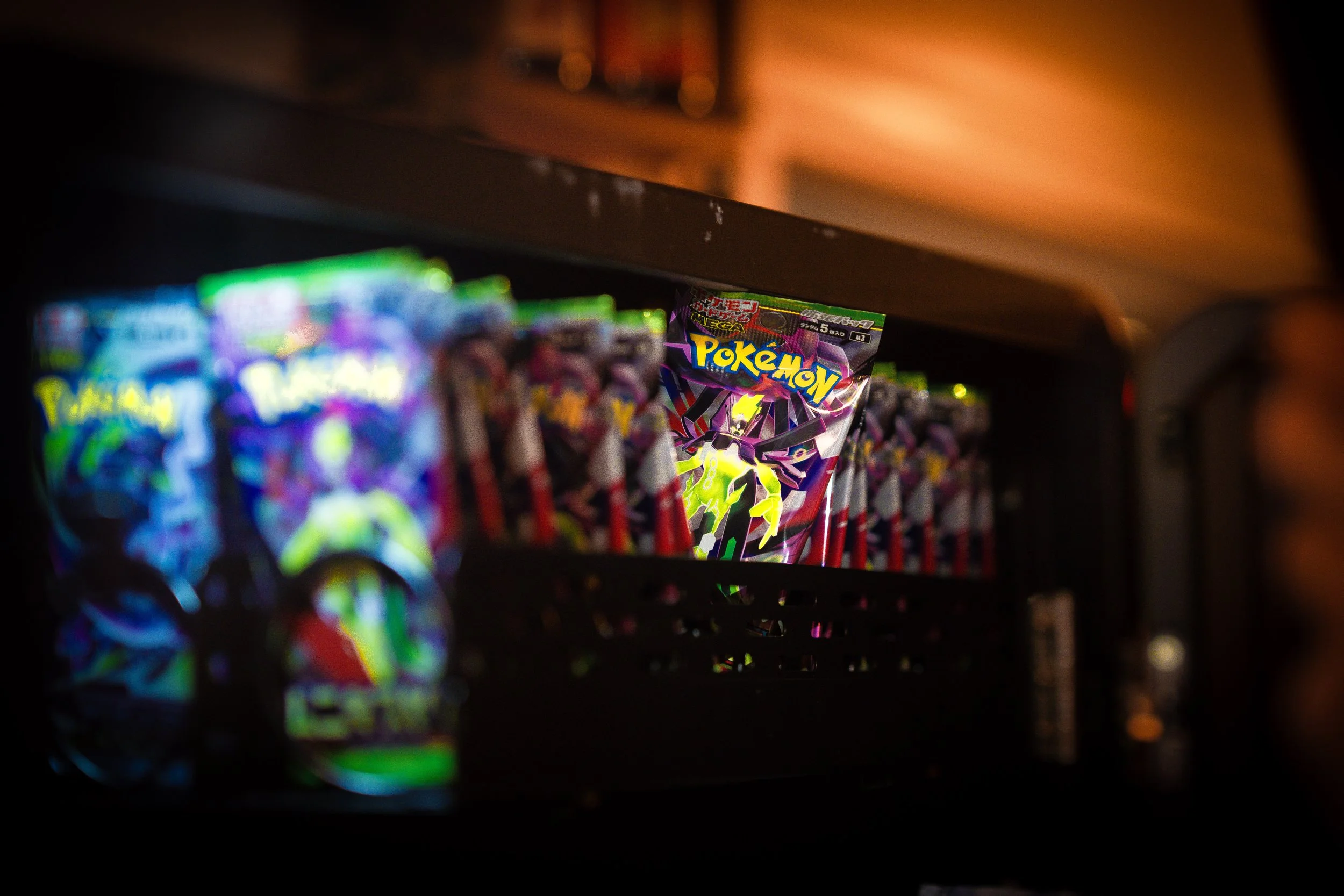 Zoomed in on TCG packs in the Packspot  vending machine