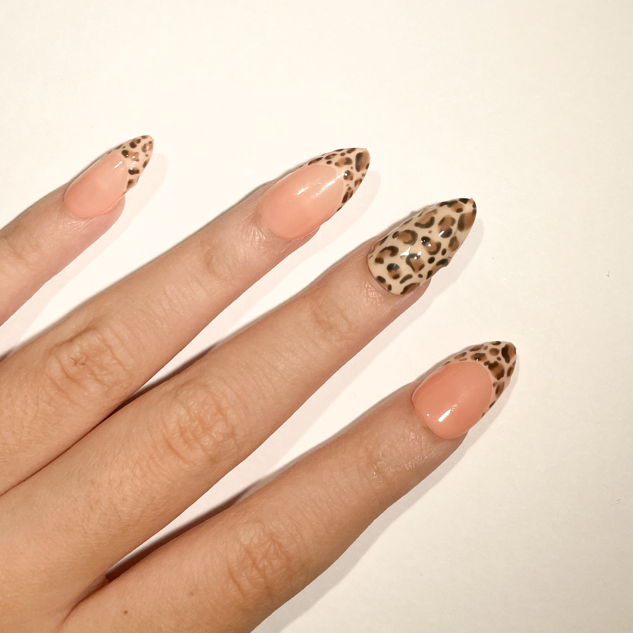 CheetahPrintNailsFingers.PNG