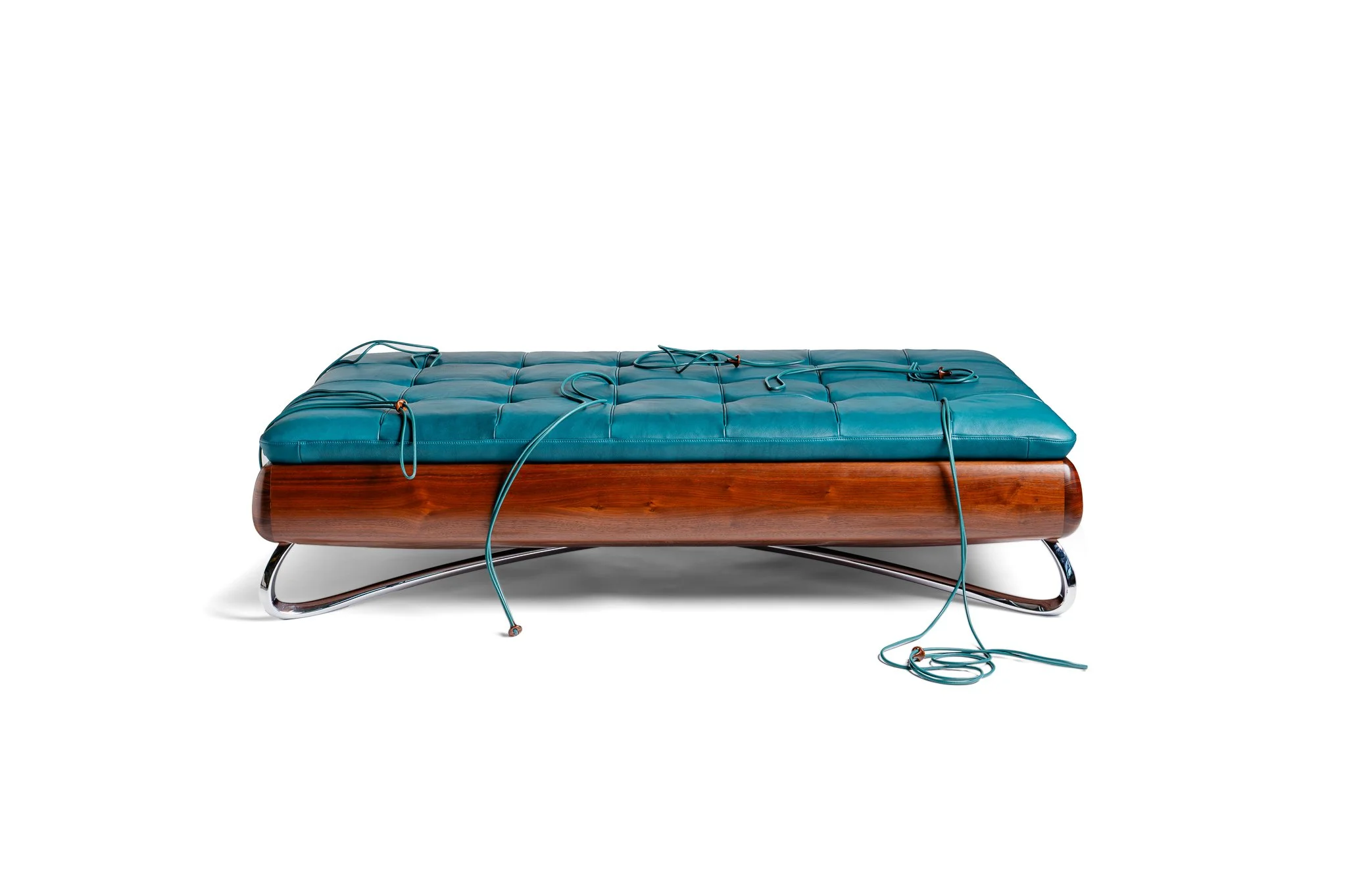 Rosetta Daybed in stained American walnut and full-grain Ocean leather.