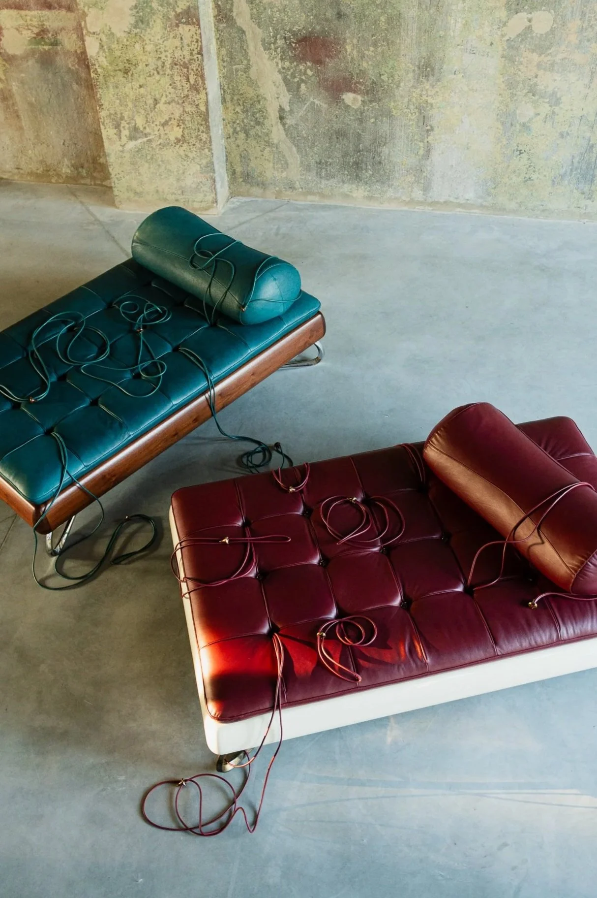 Rosetta Daybed in stained American walnut and full-grain Ocean leather. Rosetta Daybed in high-gloss ivory, ziricote and full-grain Ruby leather.