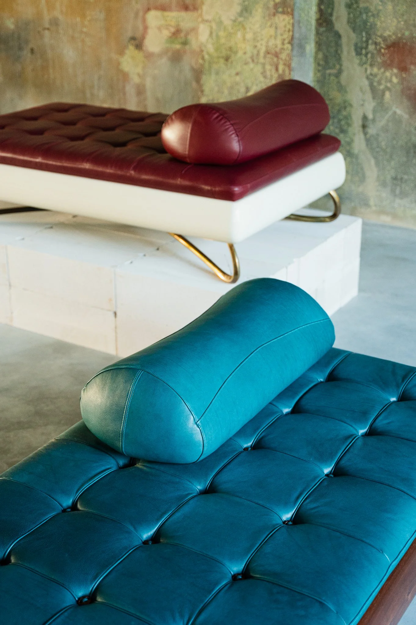 Rosetta Daybed in stained American walnut and full-grain Ocean leather. Rosetta Daybed in high-gloss ivory, ziricote and full-grain Ruby leather.
