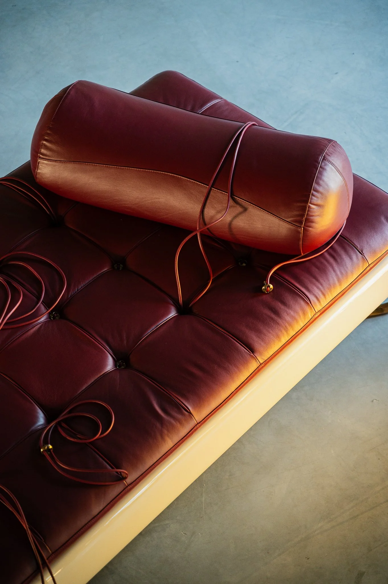  Rosetta Daybed in high-gloss ivory, ziricote and full-grain Ruby leather.