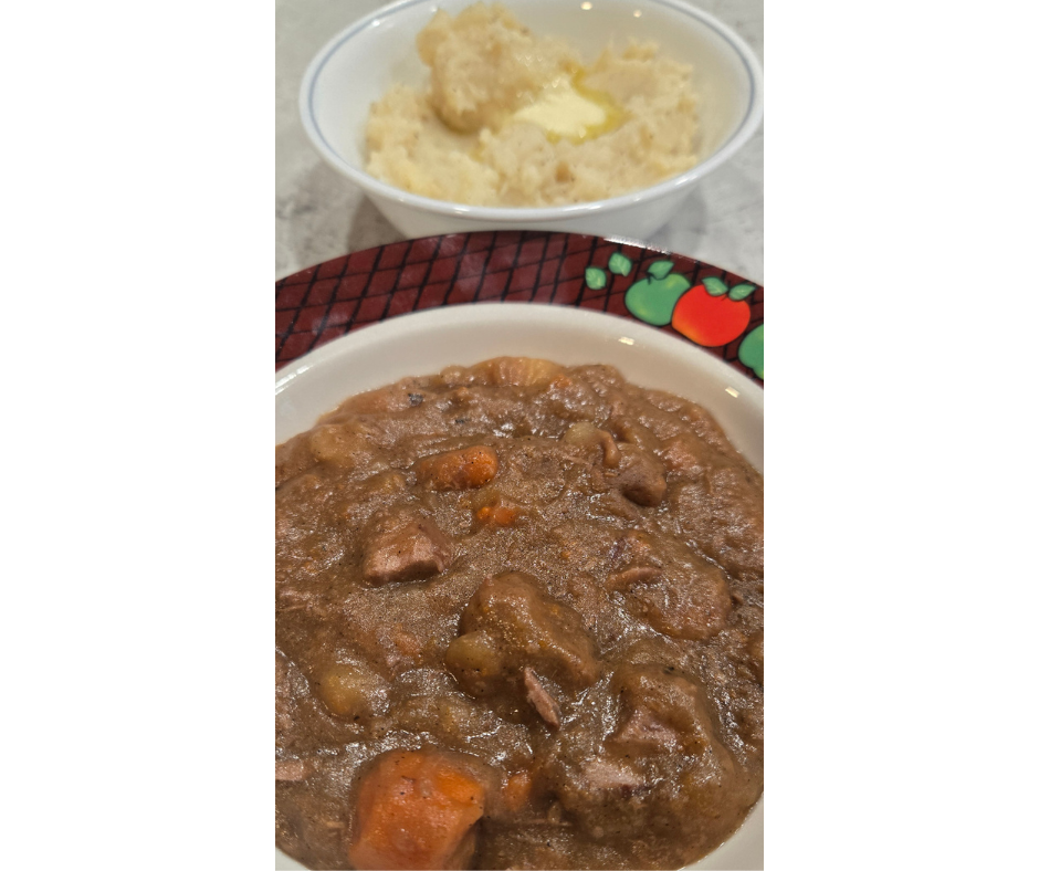 homemade beef stew and mashed potatoes