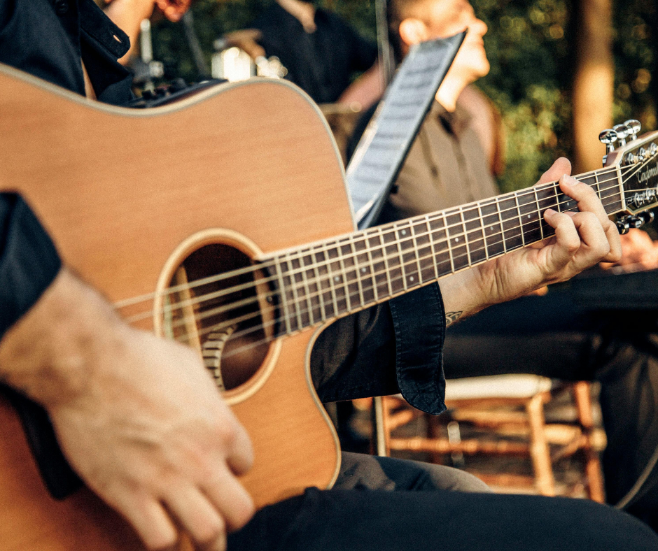 man playing a guitar