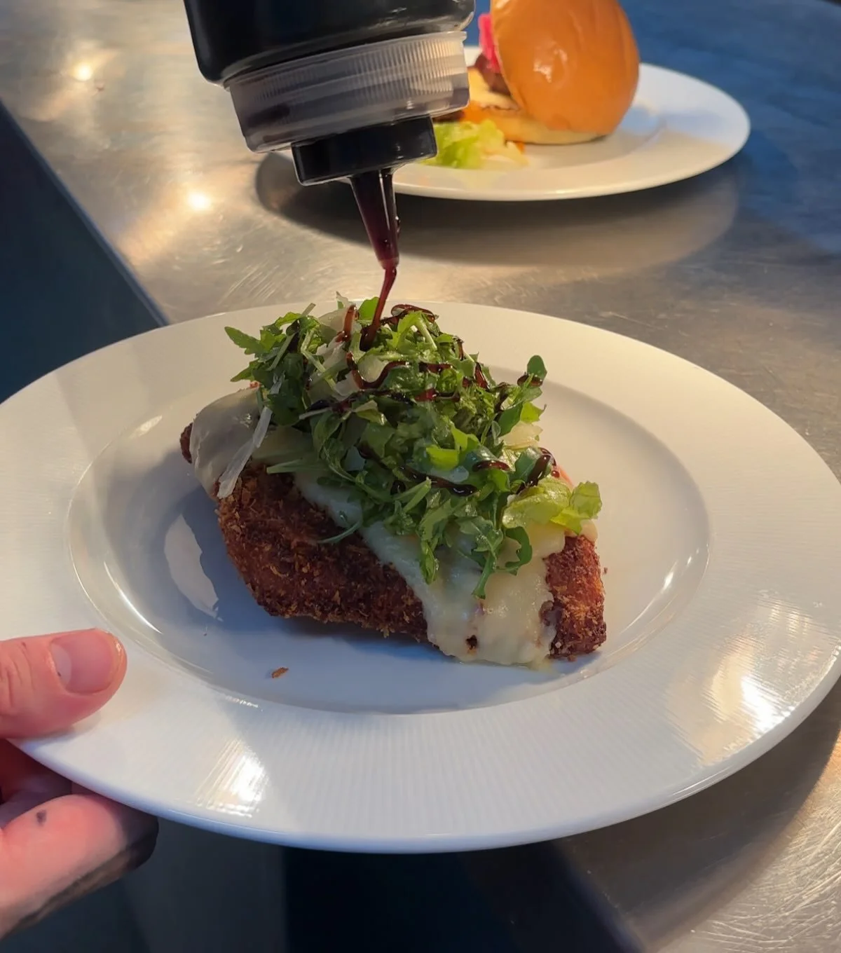 Rocket &amp; balsamic &mdash; the perfect pairing 🌿✨ 
A perfectly placed garnish on our chicken parmo, because it&rsquo;s all in the details! 🍽️