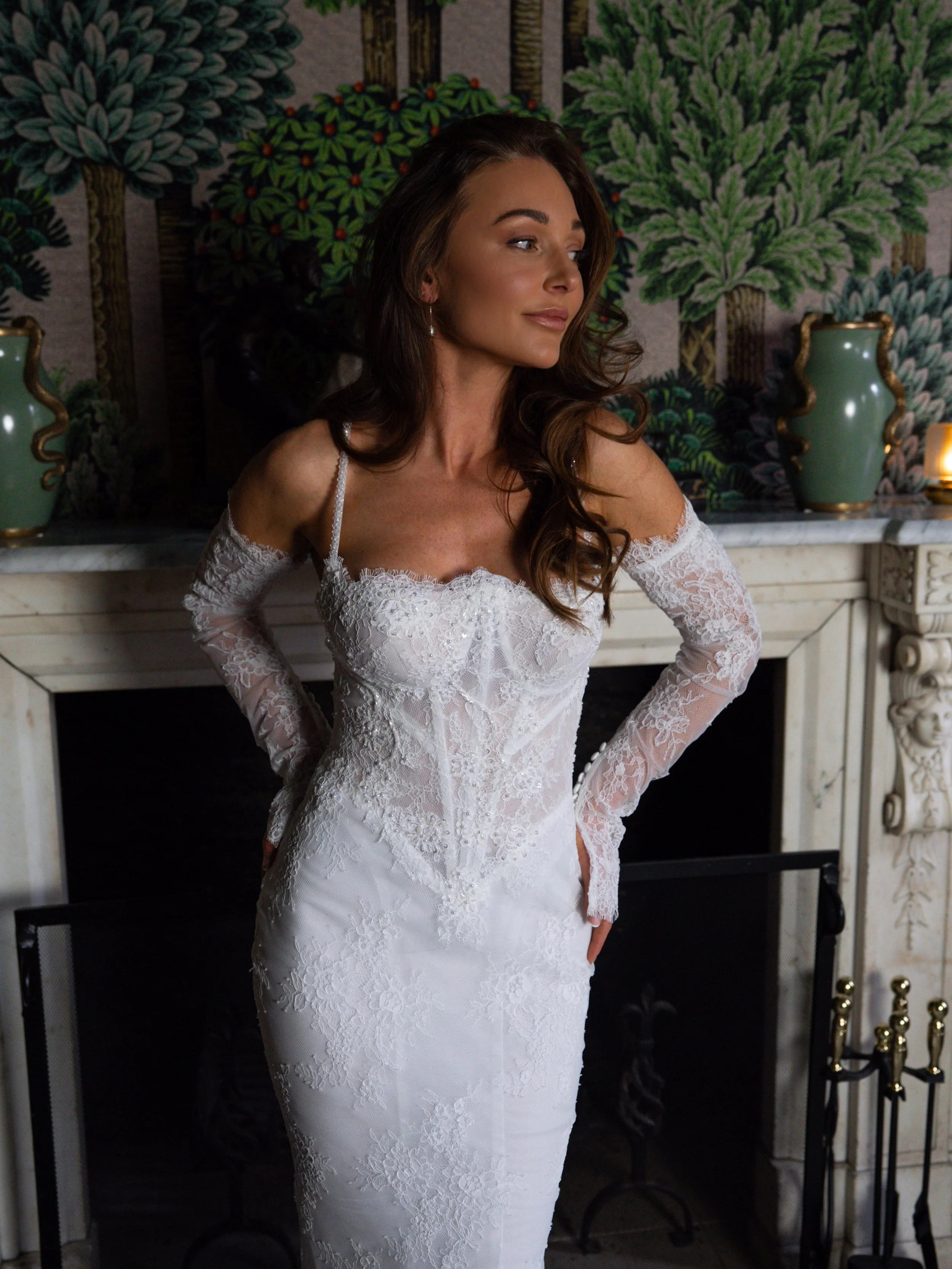 Victoria the photographer from Willow Victoria Photography wearing a dress called Capri - a sparkly long sleeve lace wedding dress