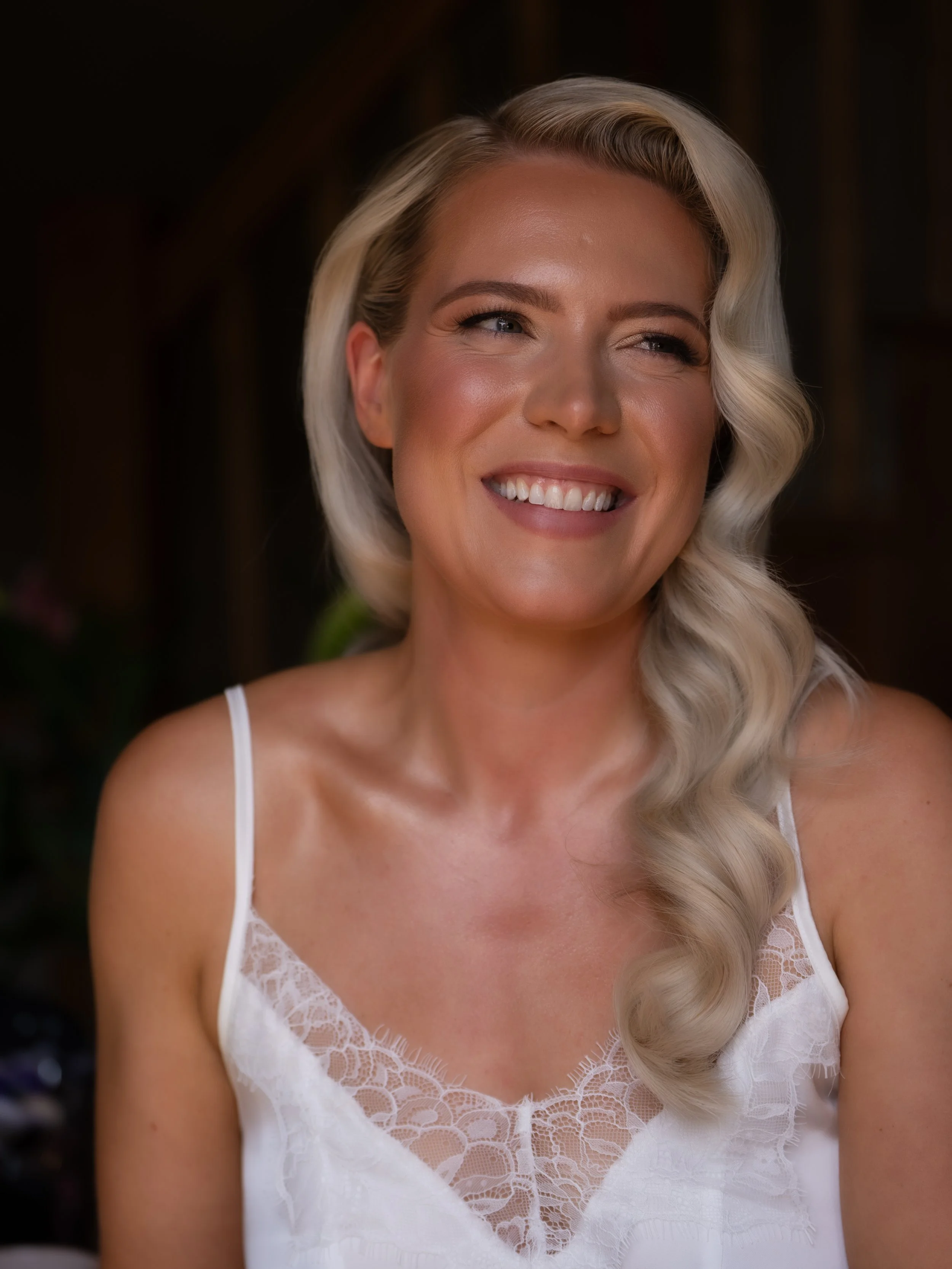 Portrait image of a bride with her hair and make up styled.