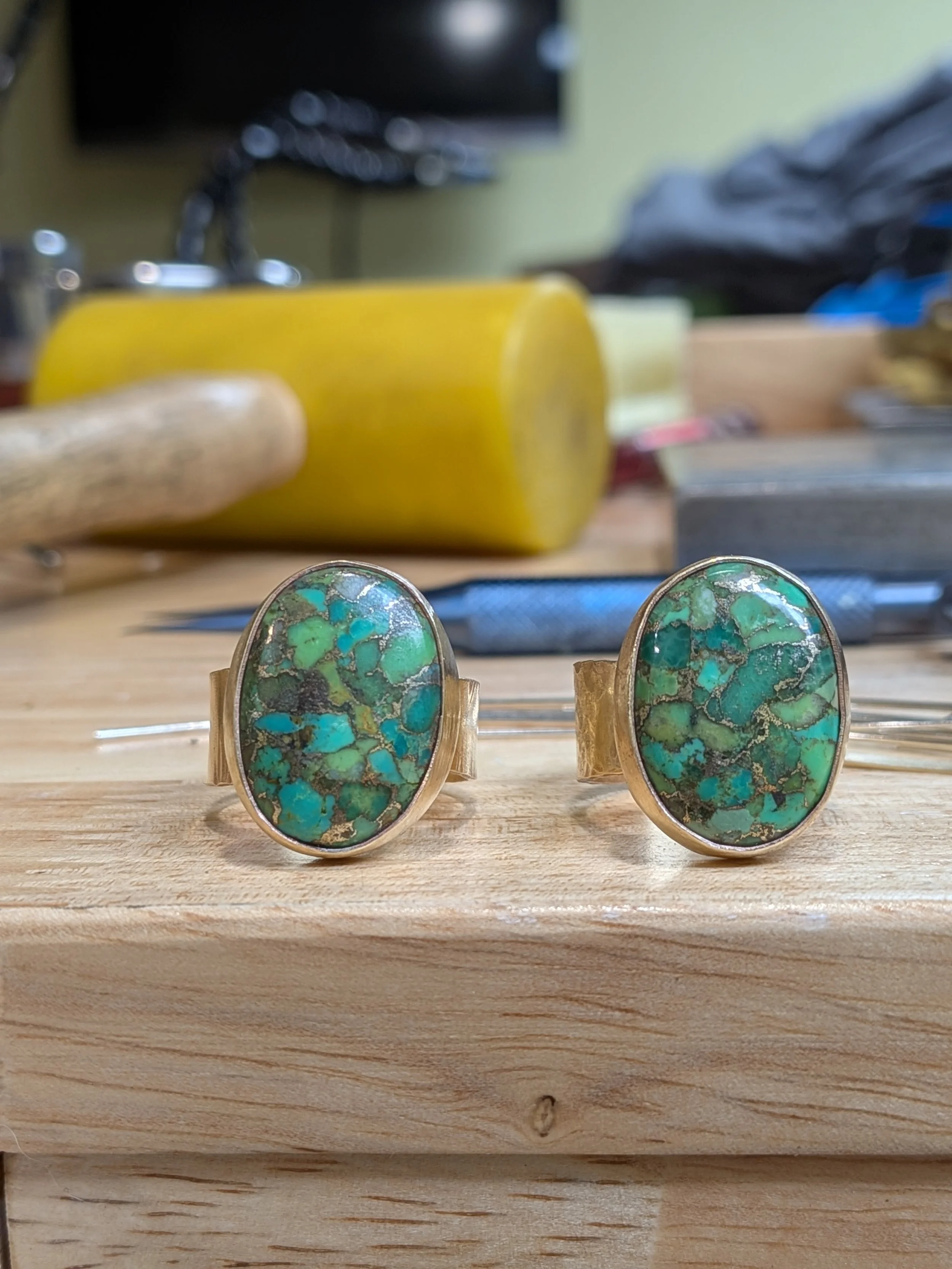 An Adjustable Brass Statement Ring  Featuring a Bezel Set Green Copper Turquois  