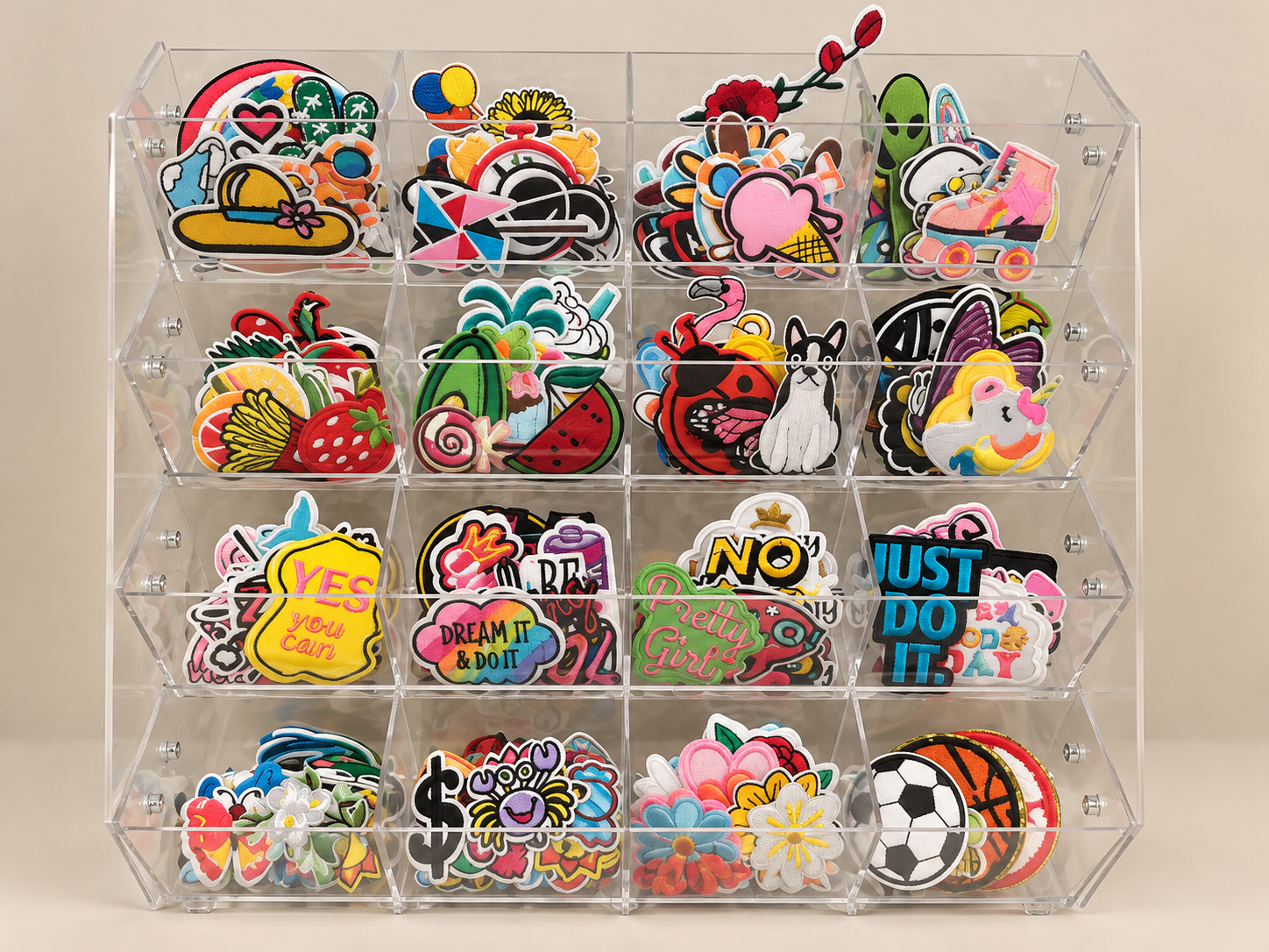 Colorful embroidered patches arranged in an acrylic display stand.
