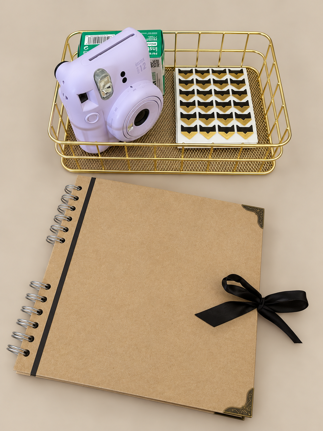 Photo of an instant photo camera and scrapbook.