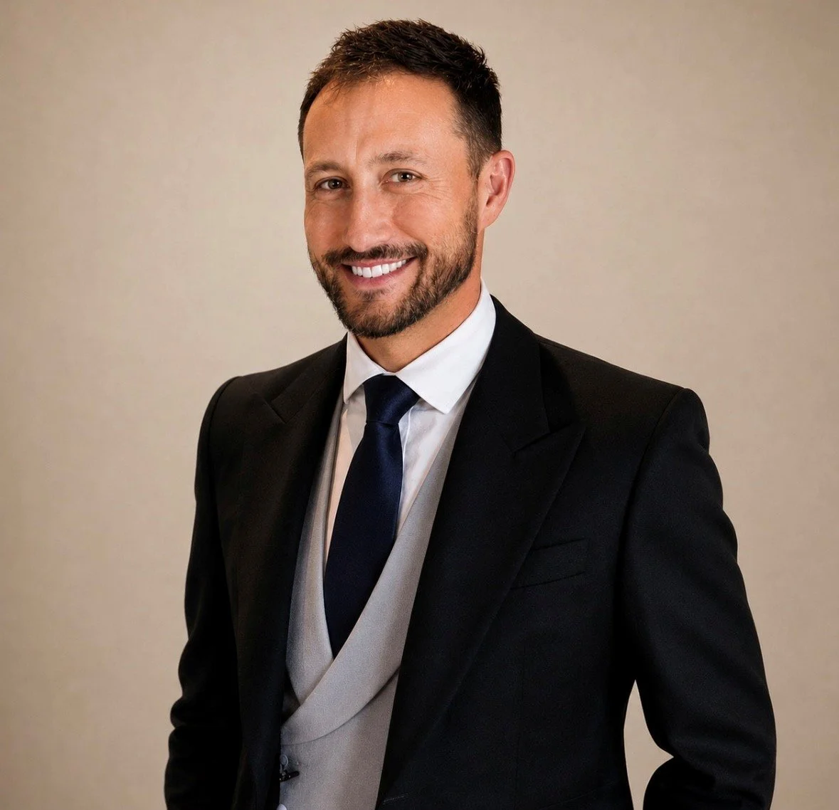 Joe Blackman wearing a morning suit