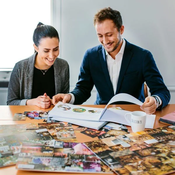 Joe and assistant planning an event