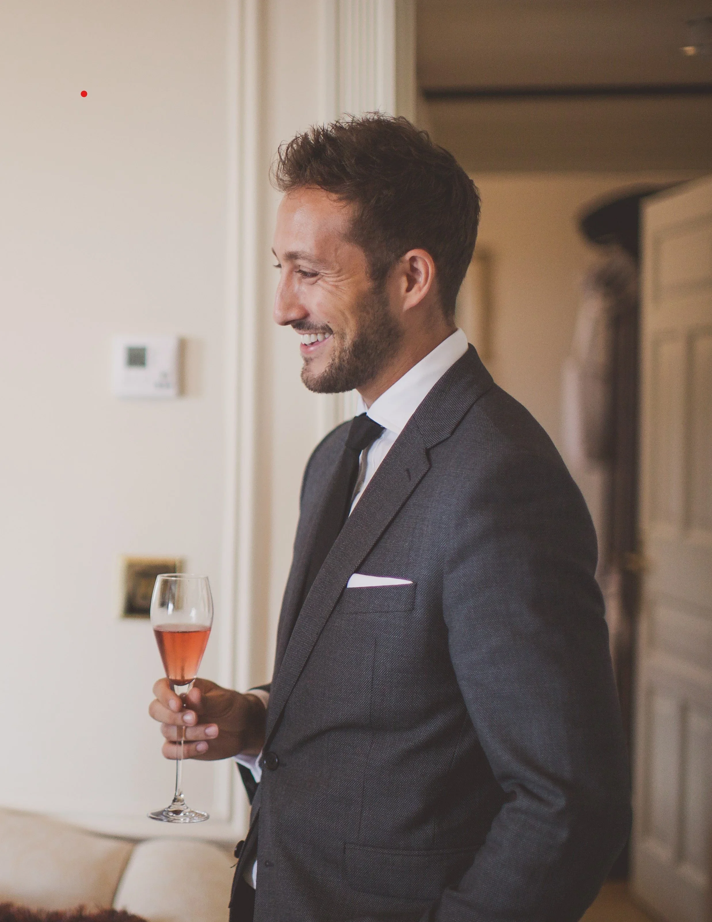 Joe Blackman MBE with champagne glass