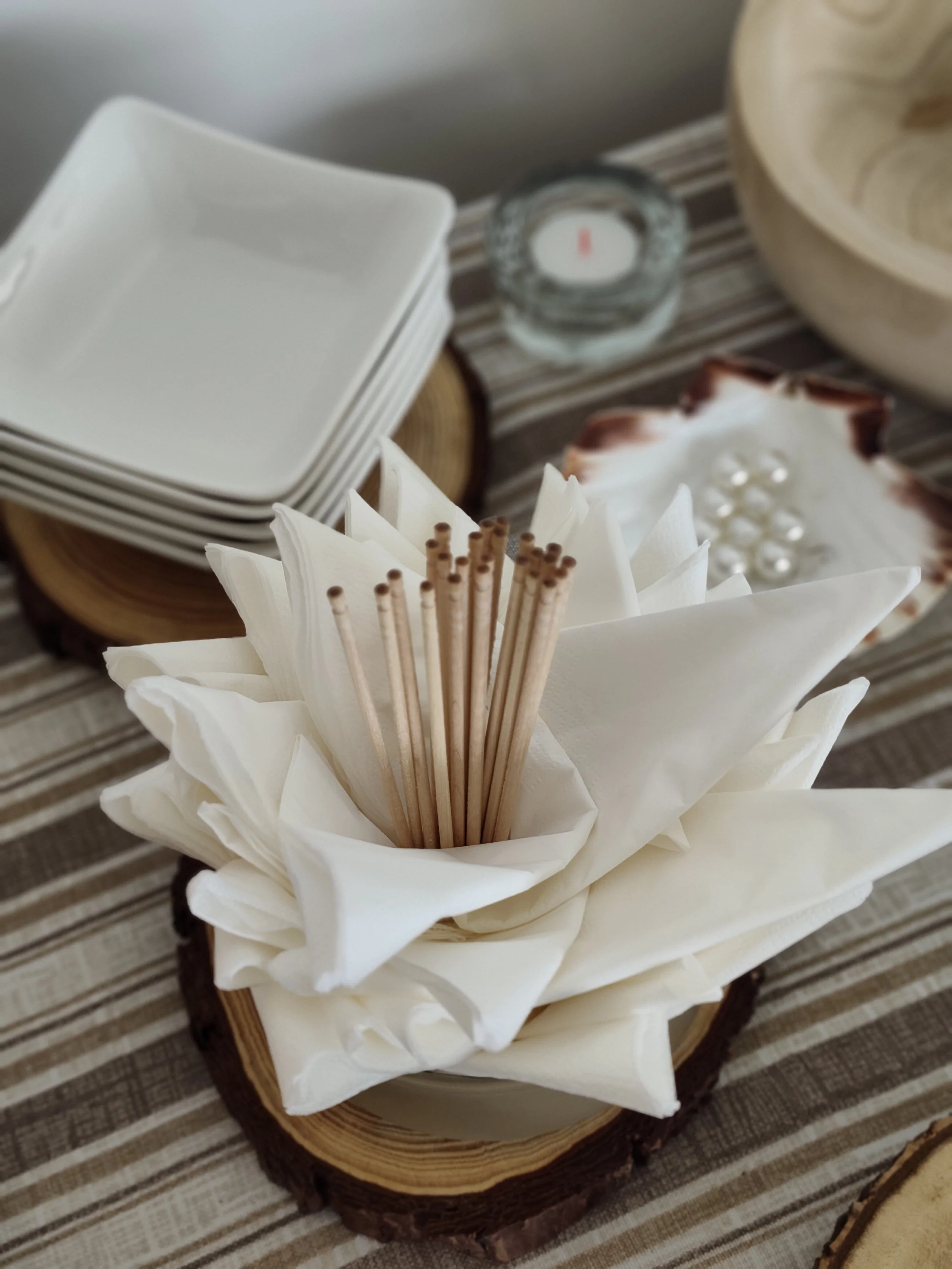 Napkins and table service details prepared for guests