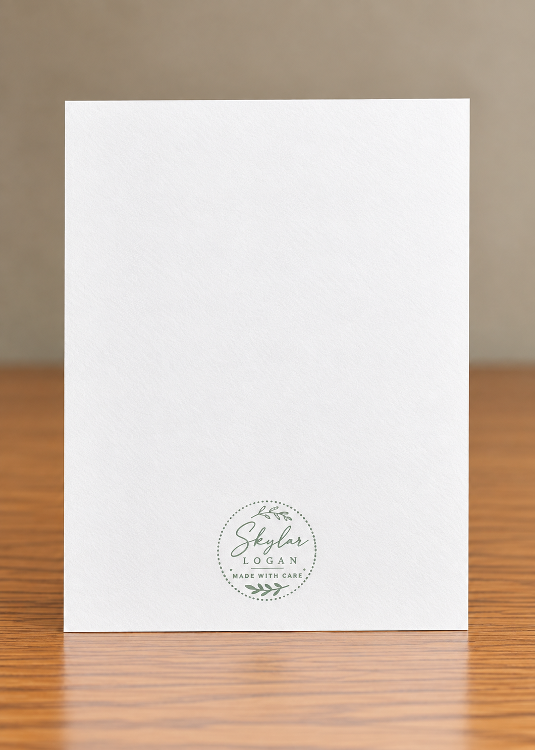 Back of Petals Upon Petals 3.5 by 5 inch floral greeting card featuring the artist’s Skylar Logan mark near the bottom.