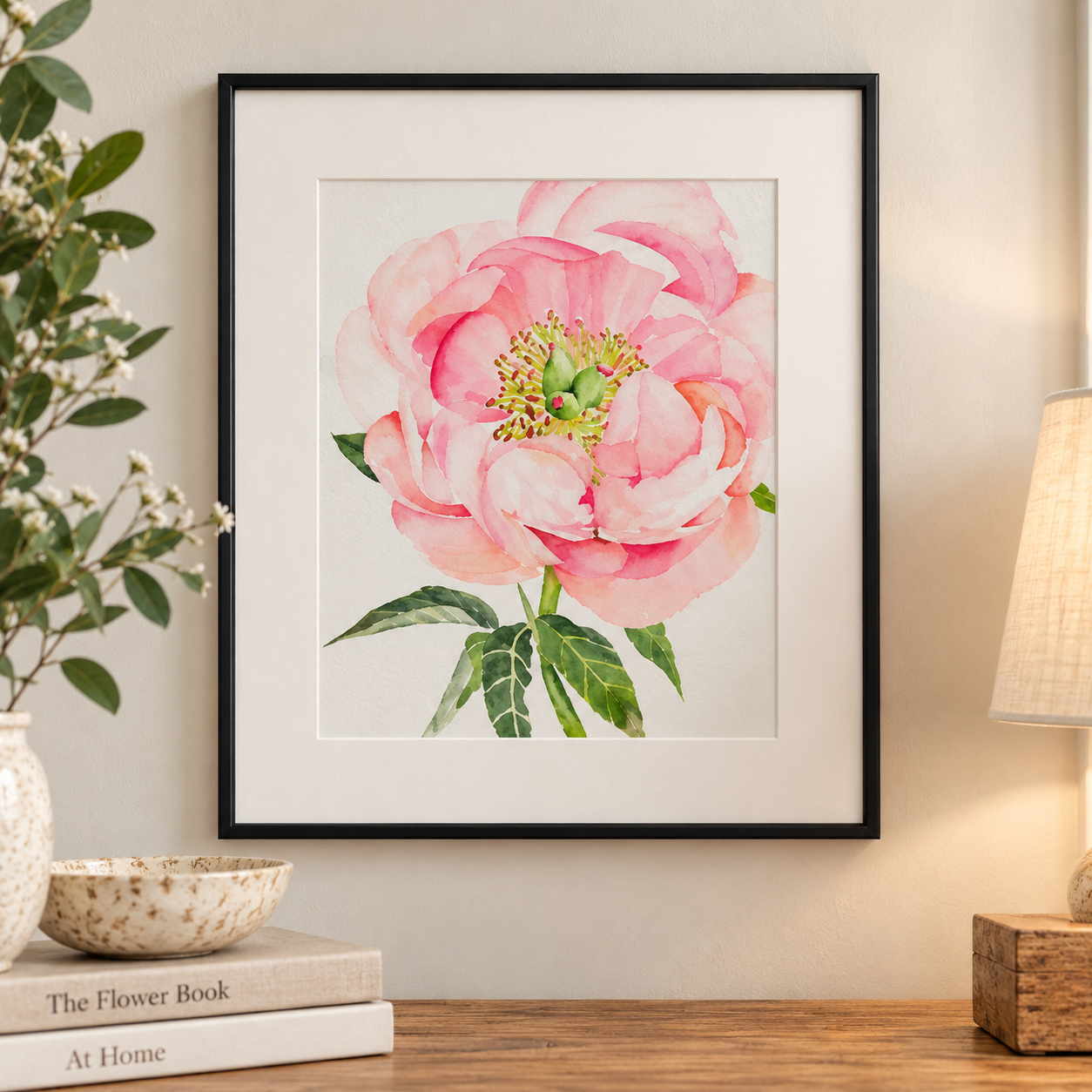 Pretty in Peony pink watercolor print displayed in a matted black 8x10 frame on a softly styled neutral wall.