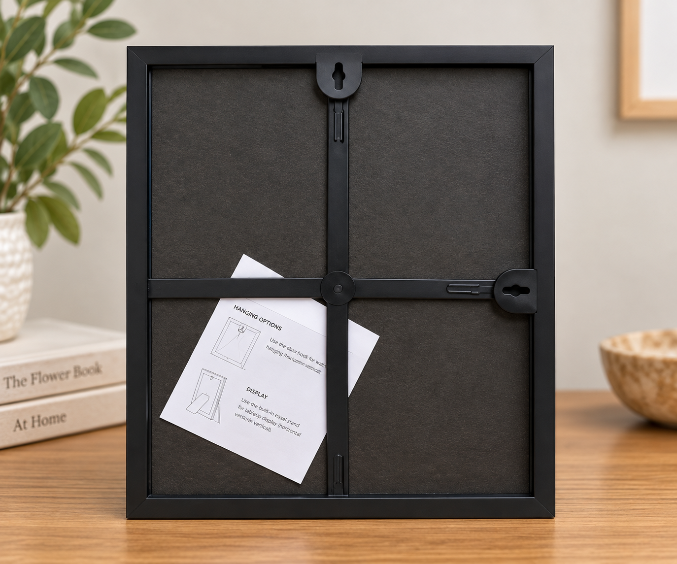 Back view of the Pretty in Peony 8x10 black frame showing the backing and hanging hardware.