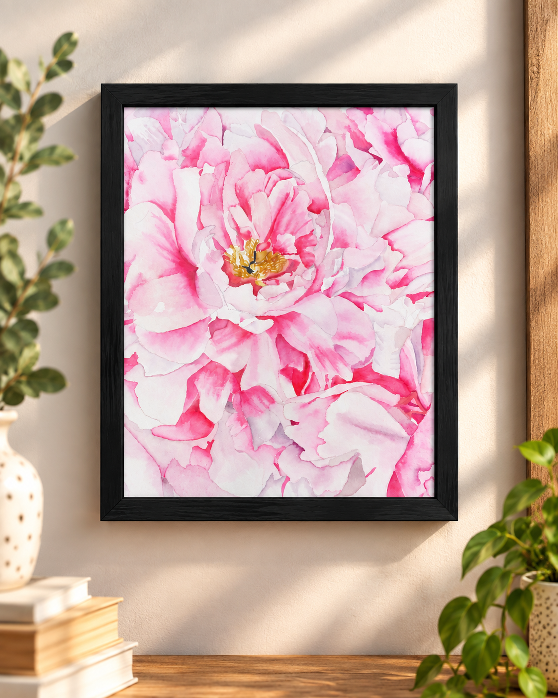 Petals Upon Petals pink peony watercolor print displayed in a black 8x10 frame on a styled wall.