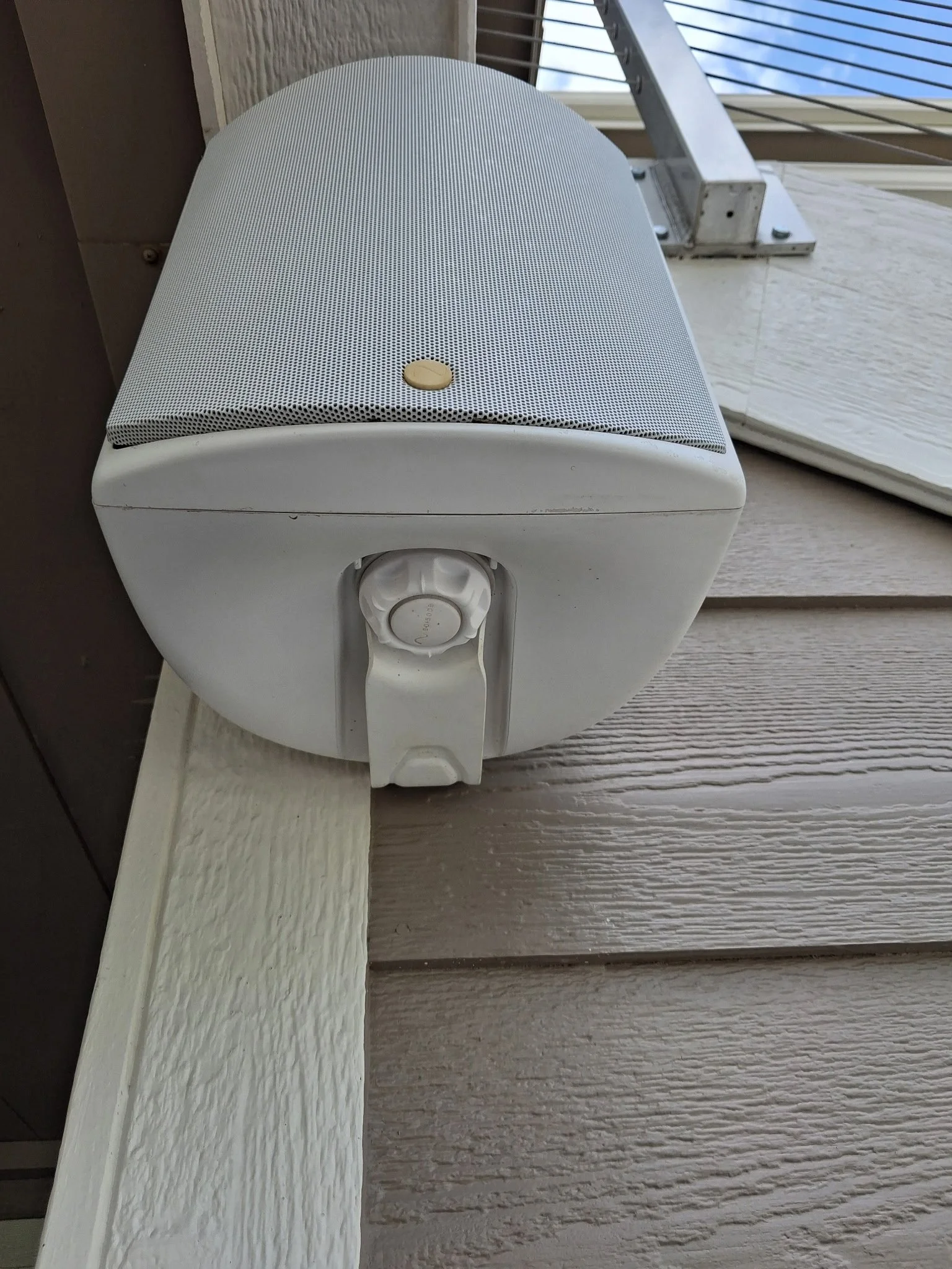 Exterior speaker before detailed and cleaned by Reflect Window Cleaning (RWC) as part of residential exterior property care and maintenance.