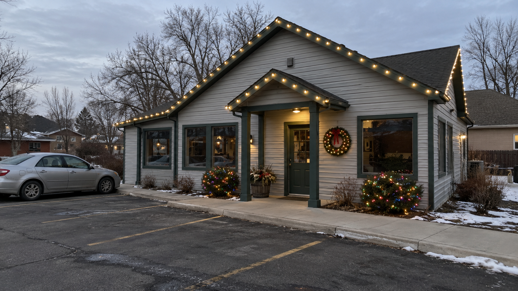 Commercial holiday lighting by Reflect Window Cleaning (RWC) featuring professional Christmas lights and seasonal decorations on a business property.