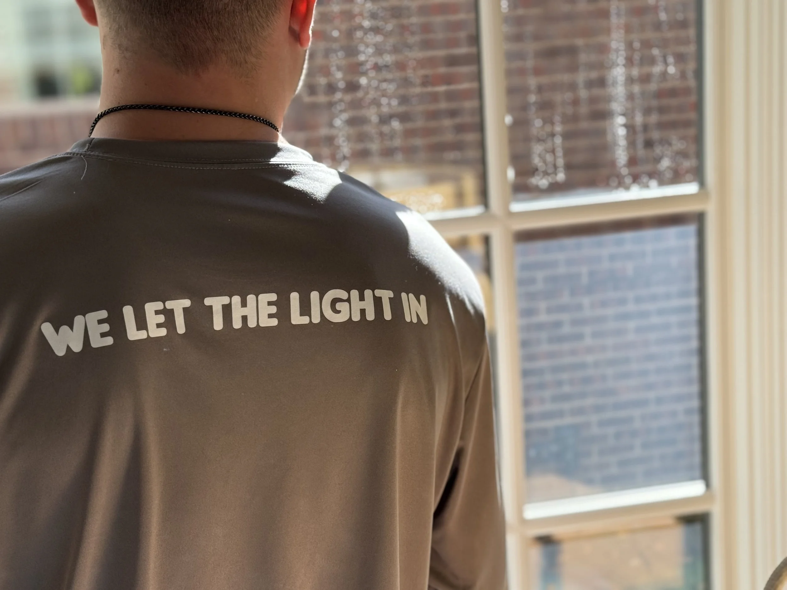 RWC professional providing detailed residential window cleaning with our Let the Light In standard of service.