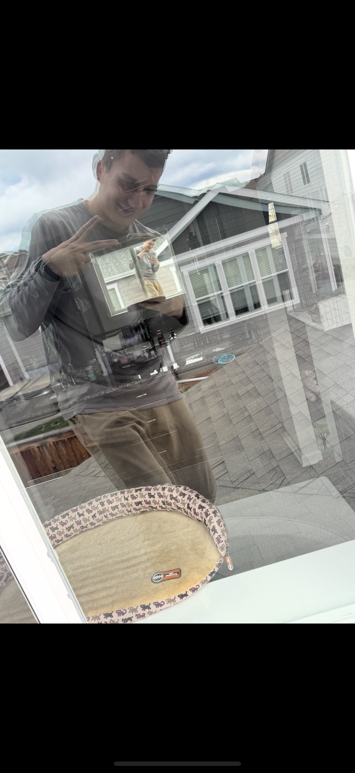 Professional window cleaning by RWC showing detailed cleaning of residential glass, frames, and surrounding window surfaces.
