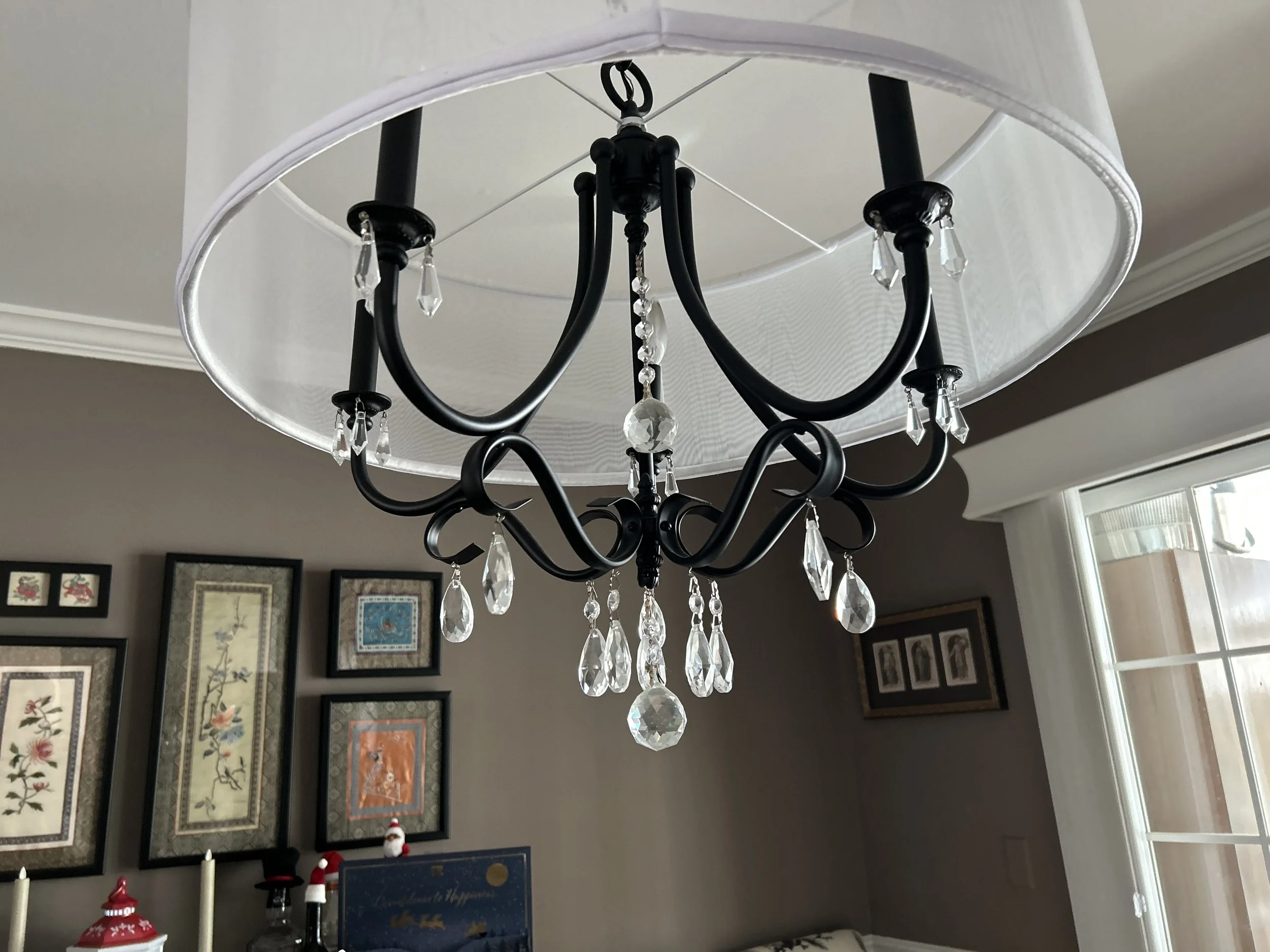 Residential dining room chandelier professionally cleaned and detailed by RWC as part of interior property care.