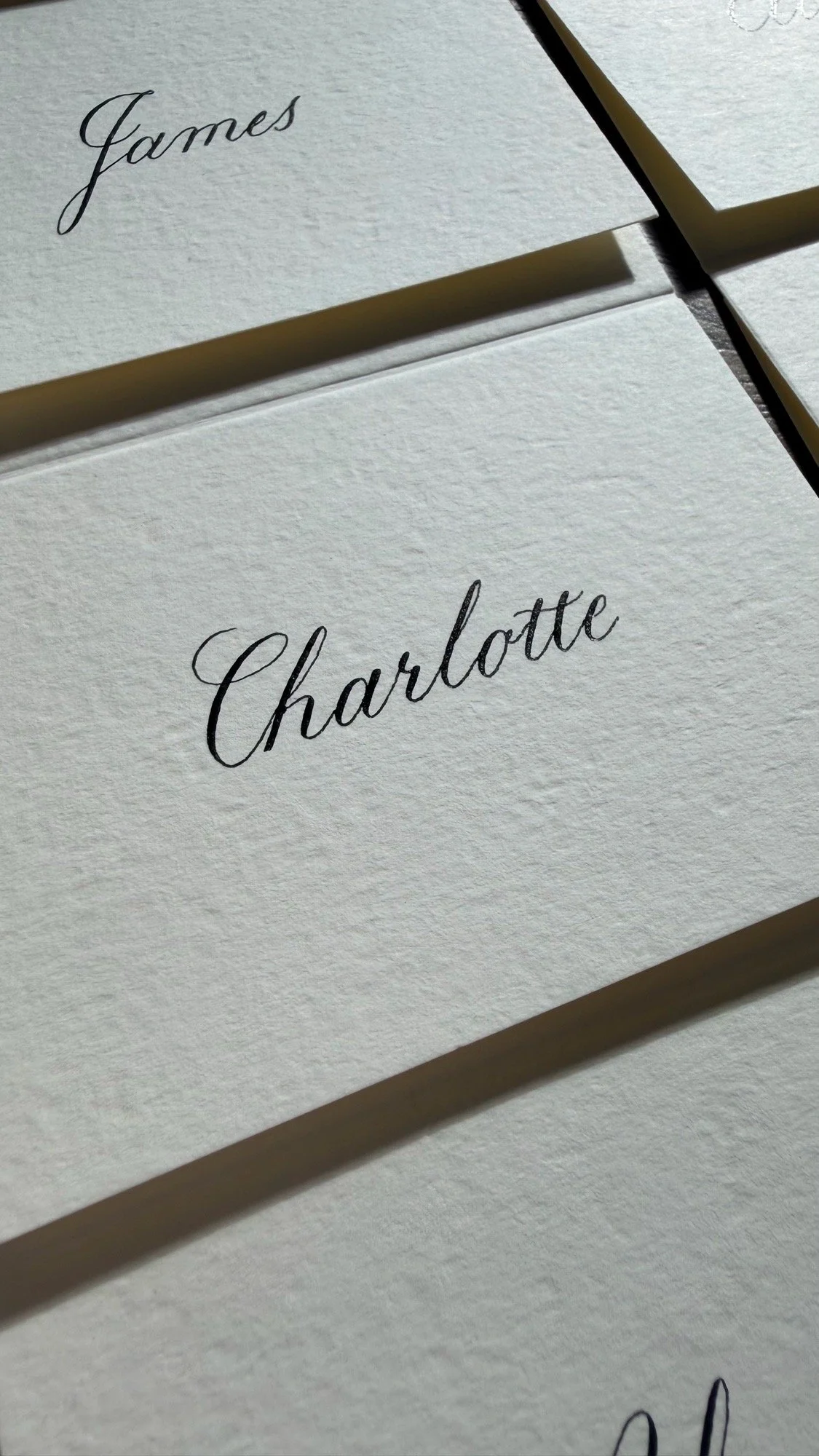 Classic Copperplate calligraphy on ivory place card